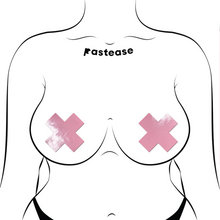 Load image into Gallery viewer, Plus X: Faux Latex Pleather Vinyl Baby Pink Cross Nipple Pasties by Pastease®. Two shiny pastel pink cross shaped nipple covers shown on a femme body outline for size reference on a white background.
