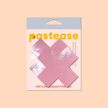 Load image into Gallery viewer, Plus X: Faux Latex Pleather Vinyl Baby Pink Cross Nipple Pasties by Pastease®. Two shiny pastel pink cross shaped nipple covers shown in the pastease packaging on a peach pink background.
