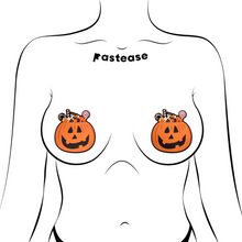 Load image into Gallery viewer, The Trick-or-Treat Pumpkin Pasties with Candy Nipple Covers by Pastease®. Two jack o lantern carved pumpkins stuffed full of various halloween candy nipple covers shown on a femme body outline for size reference on a white background. Perfect for festivals, pride, burlesque, raves, only fans content or parties.
