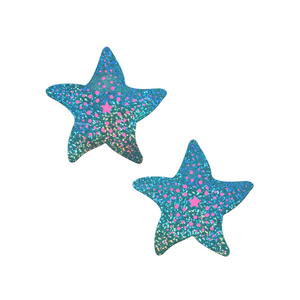 The Starfish: Twinkling Seafoam Green & Pink Print Sea Star Nipple Pasties by Pastease®. Two aqua blue with holographic glitter and pink dots starfish shaped nipple covers on a white background. Perfect for a festival, burlesque performance, pride or parties.