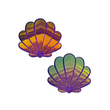 Load image into Gallery viewer, The Mermaid Shells Pasties in Opalescent Purple &amp; Gold Seashell Nipple Covers by Pastease®. Two purple glitter with green to pink iridescent film sea shells on a white background. Perfect for a festival, pride, burlesque performance, only fans content or a party.
