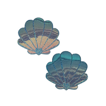 Load image into Gallery viewer, The Mermaid Shells Pasties in Opalescent Seafoam Blue Seashell Nipple Covers by Pastease®. Two blue green seafoam glitter with gold to pink iridescent film sea shells on a white background. Perfect for a festival, pride, burlesque performance, only fans content or a party.
