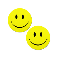 Load image into Gallery viewer, Smiley Faces: Bright Yellow Nipple Pasties by Pastease®. Two yellow smiley face nipple covers, shown on white background. Perfect for a festival, burlesque performance, pride or parties.
