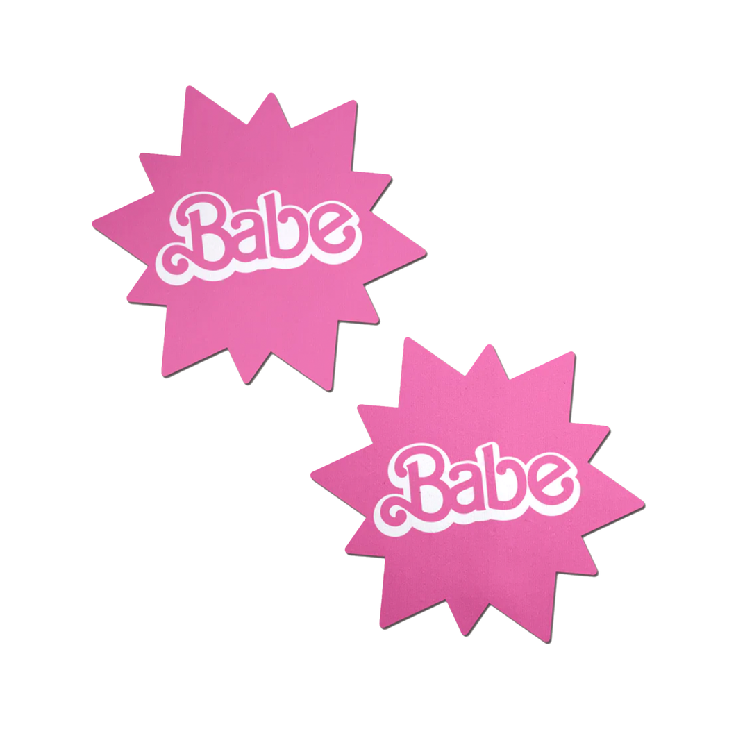 Babe Doll Pink Sunburst Pasties by Pastease®. Two barbie pink coloured sunburst star nipple covers with babe written in the centre shown on a white background. Perfect for festivals, pride, burlesque, raves, only fans content or parties.