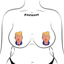 Load image into Gallery viewer, The Donald J Trump Pasties DJT Nipple Covers by Pastease shown on a femme body outline for size reference on a white background. Two nipple covers of donald j trump busts in a cartoon style with his orange tan, yellow blonde hair and blue suit with red tie, he is puckering his lips for a kiss. Perfect for a festival, burlesque performance, drag shows, pride or parties.
