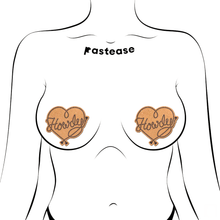 Load image into Gallery viewer, Howdy&#39; Cowboy Rope Heart Lasso Pasties Nipple Covers by Pastease®. Two gold glittery lasso heart shaped nipple covers with &#39;Howdy&#39; written in lasso shown on outline of feminine chest
