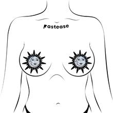 Load image into Gallery viewer, Sunburst: Sun &amp; Moon Faces on Silver Glitter Sun Nipple Pasties by Pastease®. Two glittery silver and black nipple covers in the shape of a sun and moon, shown on drawing of chest. Perfect for a festival, burlesque performance, pride or parties.

