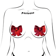 Load image into Gallery viewer, Bow: Holographic Red Bows Nipple Pasties by Pastease®. Two red glittery bow shaped nipple covers, shown on a drawing of chest. Perfect for a festival, Christmas, burlesque performance, pride or parties.
