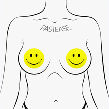 Load image into Gallery viewer, Smiley Faces: Bright Yellow Nipple Pasties by Pastease®. Two yellow smiley face nipple covers, shown on drawing of chest. Perfect for a festival, burlesque performance, pride or parties.

