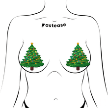Load image into Gallery viewer, Christmas Tree Nipple Pasties by Pastease®. Two green glittery Christmas tree shaped nipple covers, shown on drawing of chest. Perfect for a festival, burlesque performance, pride, Christmas or parties
