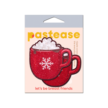 Load image into Gallery viewer, Hot Cocoa Pasties Hot Chocolate Nipple Covers by Pastease®. Two red glittery mug shaped nipple covers with white snowflake on the front of the mug and marshmallows on top. Shown in their packet on a white background.

