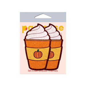Pumpkin Spice Latte Breast Pasties Nipple Covers by Pastease®. Two glittery pumpkin spiced latte with whipped cream nipple covers in the pastease cellophane packaging on a white background. Perfect for festivals, pride, burlesque, raves, only fans content or parties.