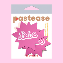 Load image into Gallery viewer, Babe Doll Pink Sunburst Pasties by Pastease®. Two barbie pink coloured sunburst star nipple covers with babe written in the centre shown in the pastease packaging on a baby pink background.
