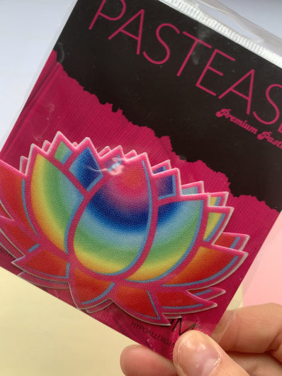 Video of the Lotus: Acid Rainbow Lotus Nipple Pasties by Pastease in the Pastease pink and black packaging.