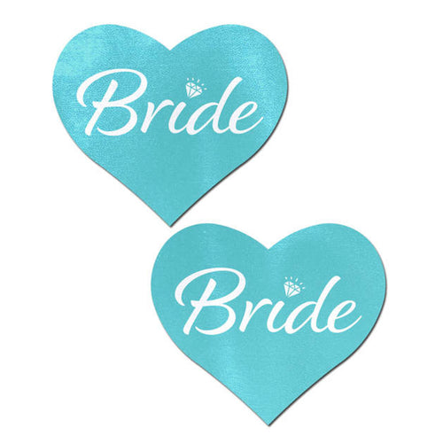Love: Blue 'Bride' Heart Nipple Pasties by Pastease. Two pastel aqua blue heart nipple covers with Bride written in white script text and a small diamond over the i, shown on a white background. Perfect for a festival, pride, burlesque performance, only fans content or a party.