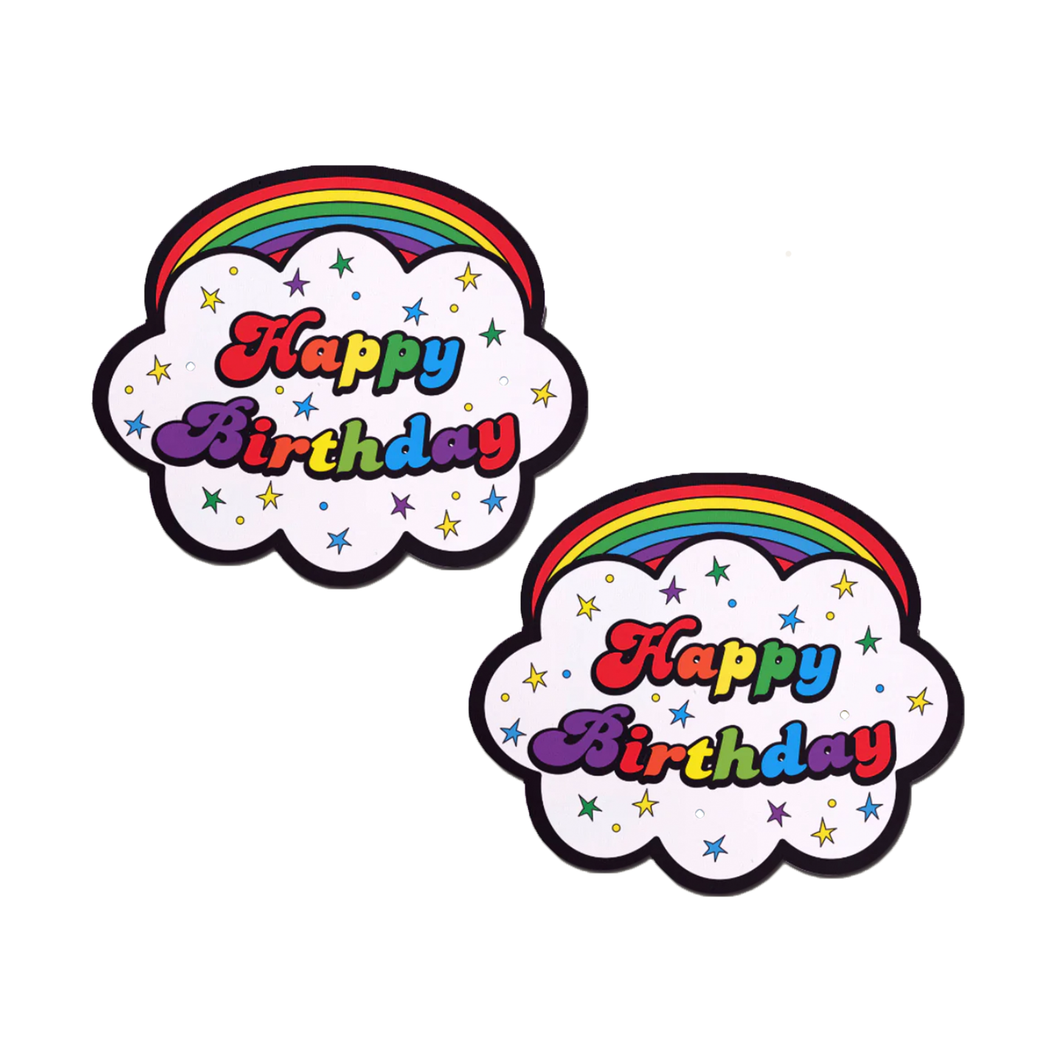 Cloud: Rainbow 'Happy Birthday' Cloud Nipple Pasties by Pastease® o/s. Two rainbow cloud shaped nipple covers on a white background. Perfect for a festival, pride, burlesque performance, only fans content or a party.