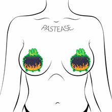 Load image into Gallery viewer, green black and orange bubbling cauldron nipple cover pasties with glittery finish shown on a femme body outline for size reference on a white background.
