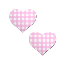 Load image into Gallery viewer, Love: Pink Gingham Heart by Pastease®. Two pink gingham check pattern heart shaped nipple covers on a white background. Perfect for a festival, pride, burlesque performance, only fans content or a party.
