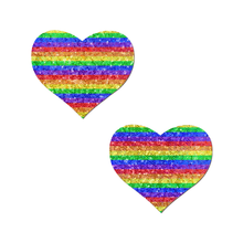 Load image into Gallery viewer, Love: Glittering Double Rainbow Heart Pasties by Pastease® o/s. Two glittery rainbow heart shaped nipple covers on a white background. Perfect for a festival, pride, burlesque performance, only fans content or a party.
