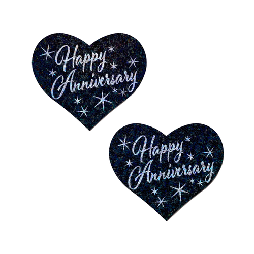 Love: 'Happy Anniversary' Heart Pasties by Pastease® o/s. Two glittery black heart shaped nipple covers with silver italic font reading happy anniversary and stars on a white background. Perfect for a festival, pride, burlesque performance, only fans content or a party.