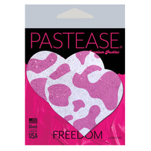 Load image into Gallery viewer, Love: Pink Strawberry Cow Print Heart on Soft Glittery Velvet Nipple Pasties by Pastease shown in the pink and black pastease cellophane packaging on a white background. 
