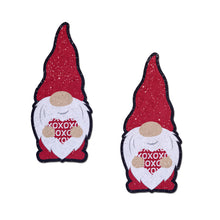 Load image into Gallery viewer, Valentine Sweetheart Garden Gnome Gonk Nipple Covers by Pastease®. Two red glitter gonk gnomes smiling holding up a red heart with repeating white XOXO pasties shown on a white background. Perfect for a festival, pride, burlesque performance, only fans content or a party.

