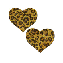 Load image into Gallery viewer, Love: Glittering Gold Leopard Print Heart Nipple Pasties by Pastease. Two heart shaped nipple covers in sparkly gold with brown leopard print all over shown on a white background. Perfect for a festival, pride, burlesque performance, only fans content or a party.
