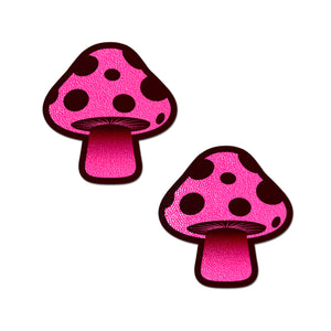 The Mushroom: Neon Pink Shroom Nipple Pasties by Pastease. Two pink and black glittery mushroom nipple covers on a white background. Perfect for a festival, pride, burlesque performance, only fans content or a party.