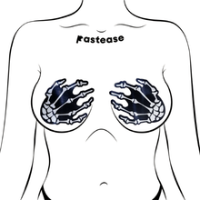 Load image into Gallery viewer, White Boney Skeleton Hands on black Nipple Pasties by Pastease shown on a femme body outline for size reference on a white background.
