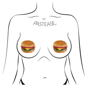 The Burger: Delicious Cheeseburger Nipple Pasties by Pastease shown on a femme body outline for size reference on a white background.