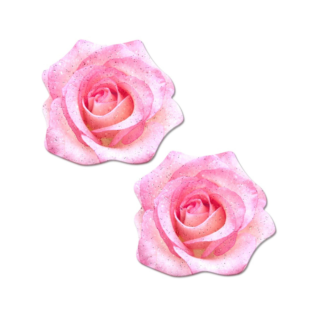 Rose: Pink Glitter Velvet Blooming Rose Nipple Pasties by Pastease o/s. Two pink glittery sparkling rose nipple covers on a white background. Perfect for a festival, pride, burlesque performance, only fans content or a party.