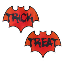 Load image into Gallery viewer, Vamp: Blood Orange Halloween Trick or Treat Bat Nipple Pasties by Pastease. Two blood orange coloured bat shape with halloween trick and treat in black spooky text nipple covers on a white background. Perfect for a festival, pride, burlesque performance, only fans content or a party.
